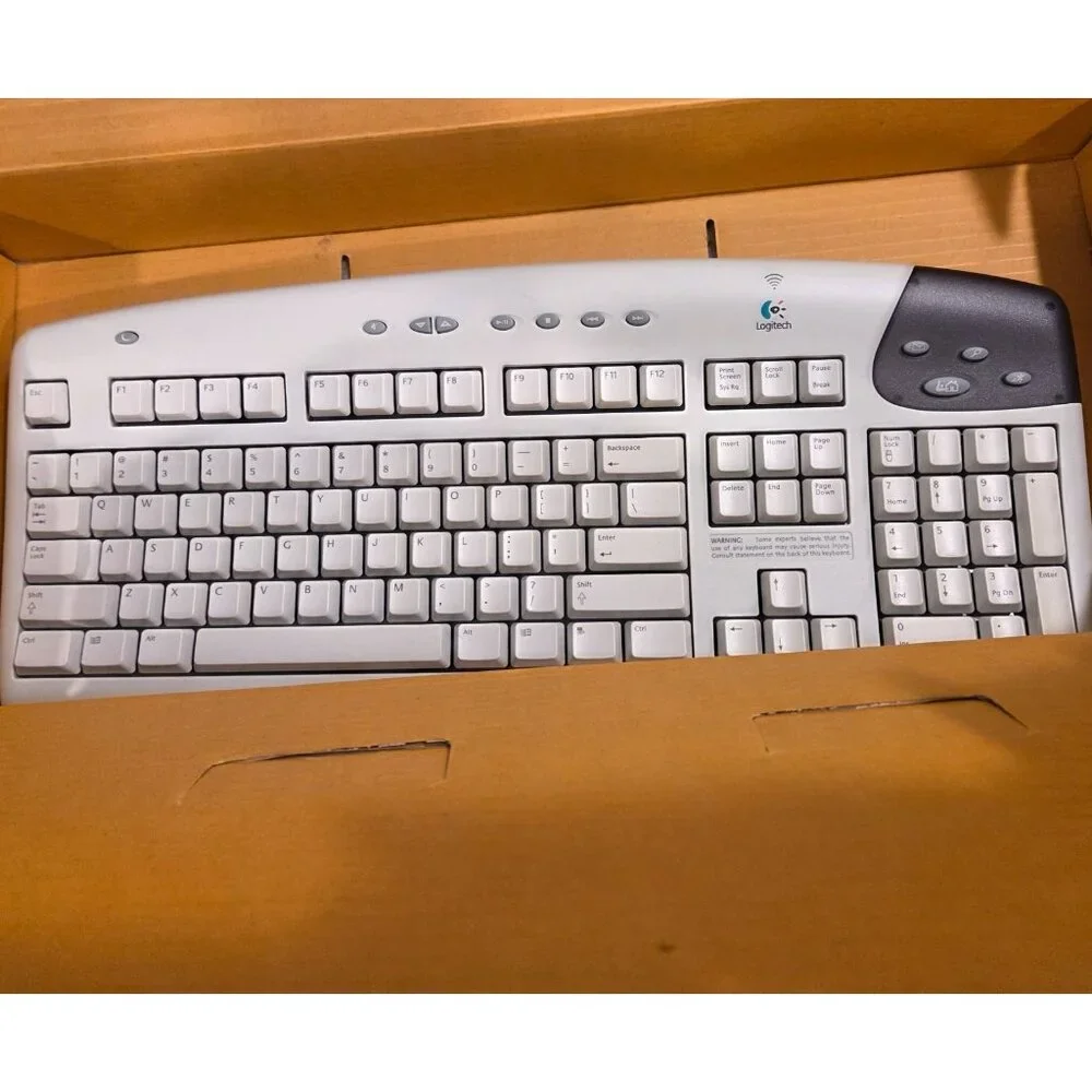 Logitech Cordless Freedom Navigator Keyboard Wheel Mouse Receiver User Guide